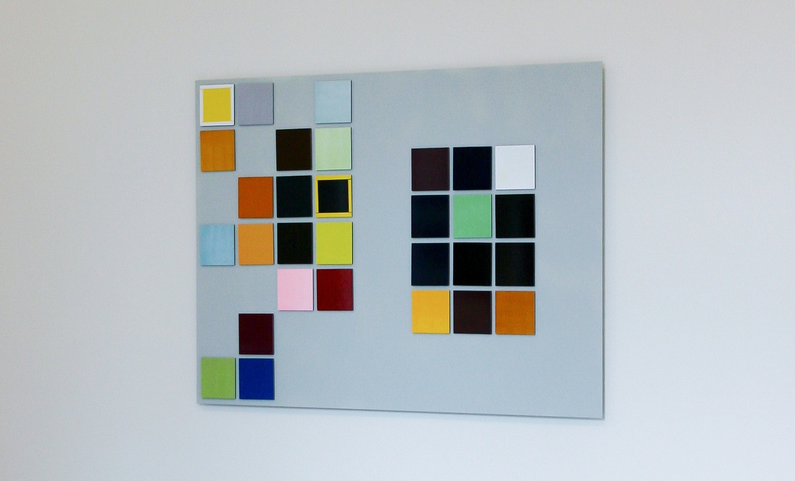 Installation view Galerie M29, Cologne | colour office, 2006, pigment colours on photographic paper, magnets, metal plate, 120 x 100 cm